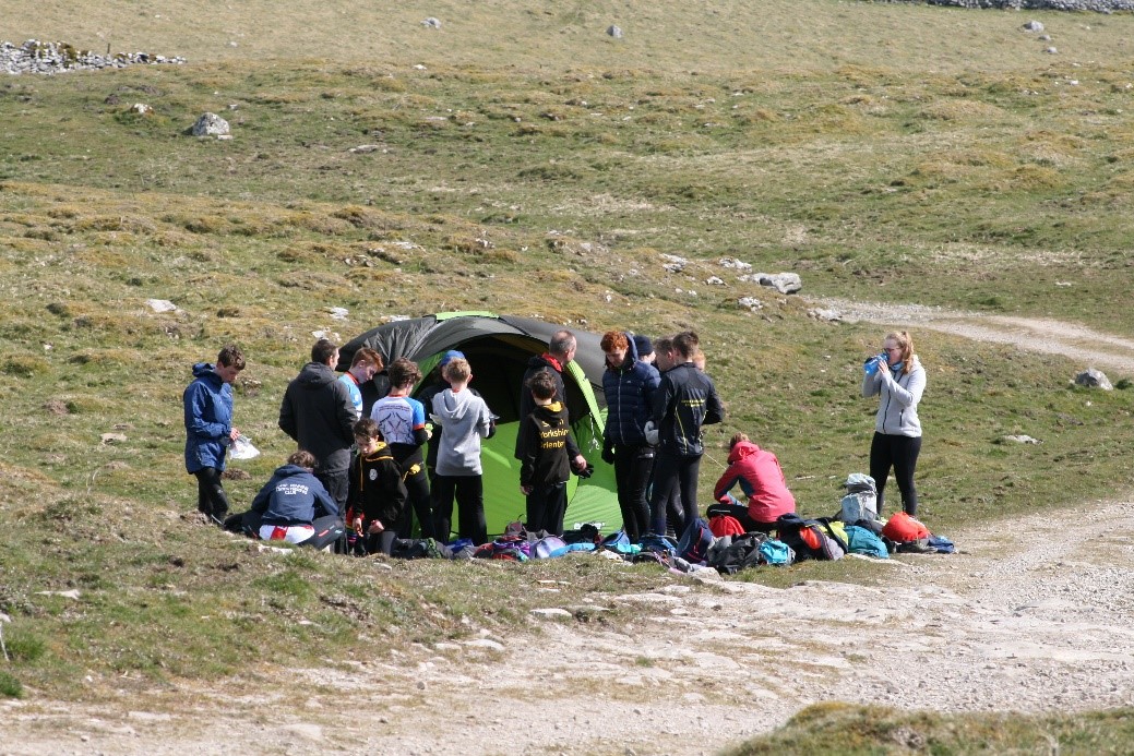 Tiring Work! Juniors chill out in the tent in between runs